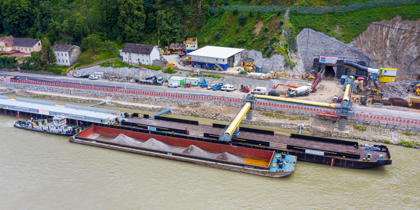Short-range waterway transport as part of a highway construction project in Linz, Austria
